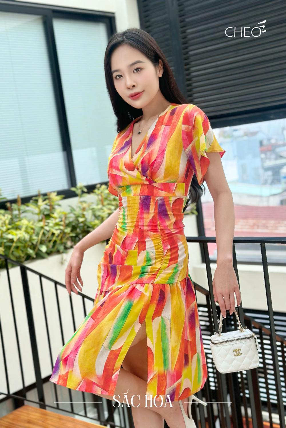 Đầm rút gấu CF xanh cam