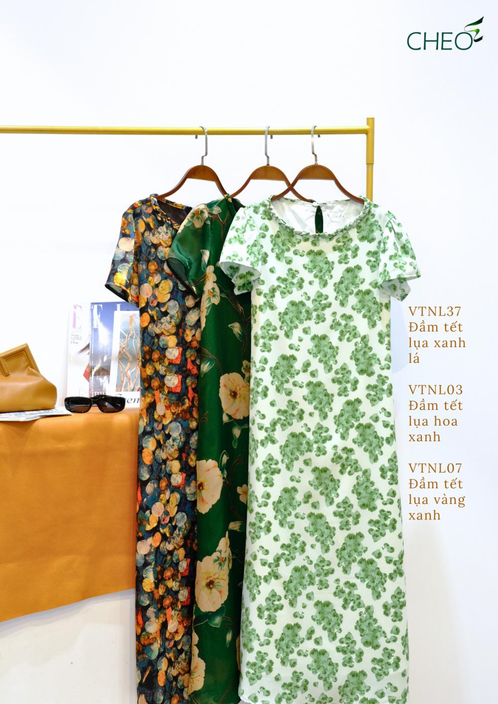 Đầm tết lụa xanh lá