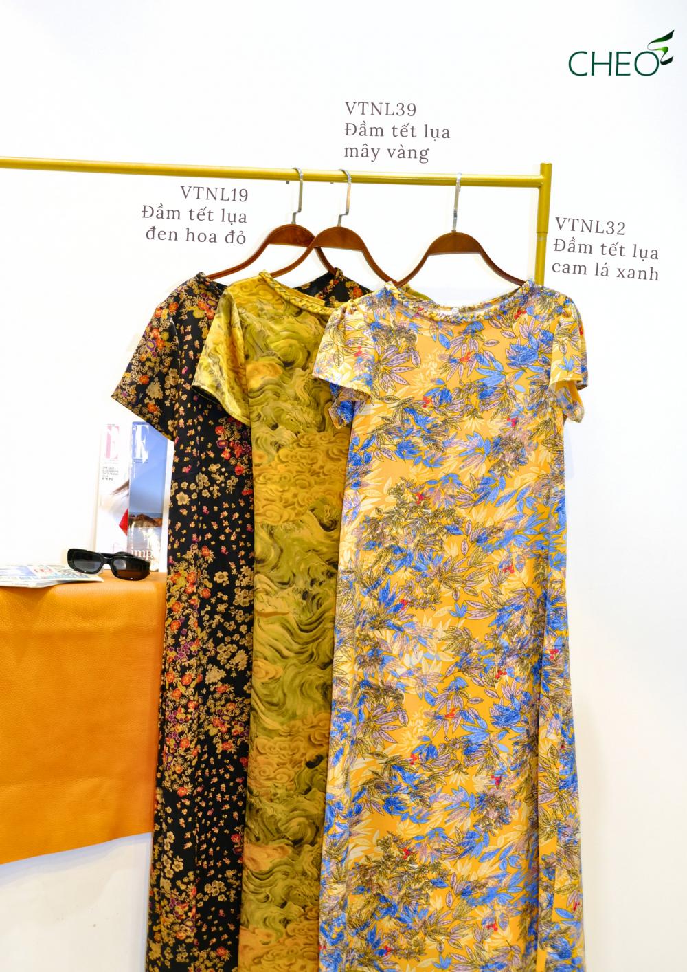 Đầm tết lụa cam lá xanh